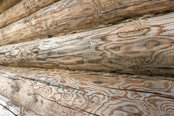 Rustic wooden logs with distinct patterns and textures