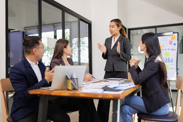 Group of Asian business working with analysis project brainstorm in modern office, Asian...