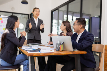 Group of Asian business working with analysis project brainstorm in modern office, Asian...