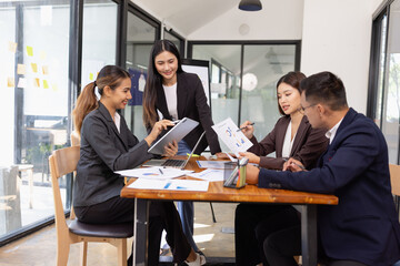 Group of Asian business working with analysis project brainstorm in modern office, Asian...