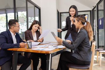 Group of Asian business working with analysis project brainstorm in modern office, Asian...