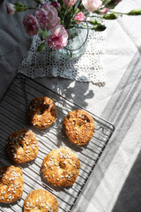 Healthy homemade oat bagels on rustic sunny background. Place for text.
