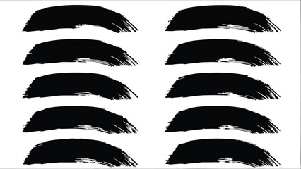 Fototapeta premium A set of ten black brush strokes arranged in two columns against a white background creating a pattern