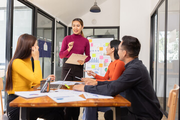 Fototapeta premium Group of Asian business people working together and presentation a meeting in office, 