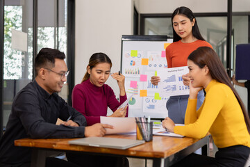 Group of Asian business people working together and presentation a meeting in office, 