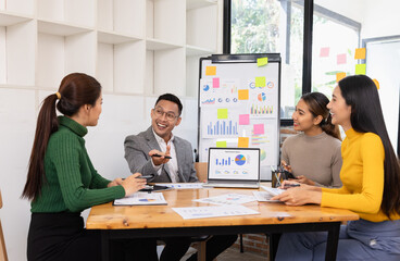 Group of business people working together with dashboard analysis and data management in conference room, Corporate business and dashboard to presentation concept.