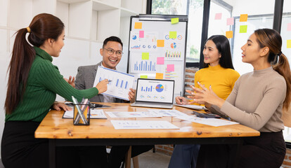 Group of business people working together with dashboard analysis and data management in conference...