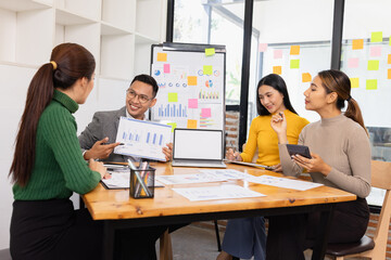 Group of business people working together with dashboard analysis and data management in conference room, Corporate business and dashboard to presentation concept.