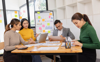 Group of business people working together with dashboard analysis and data management in conference room, Corporate business and dashboard to presentation concept.
