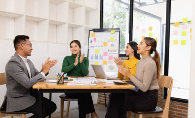 Group of business people working together with dashboard analysis and data management in conference...