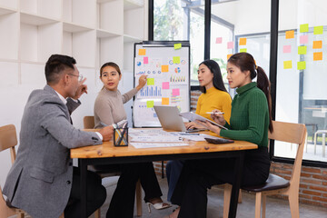 Group of business people working together with dashboard analysis and data management in conference room, Corporate business and dashboard to presentation concept.