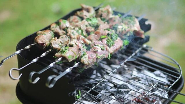 Delicious grilled meat on a barbecue.
