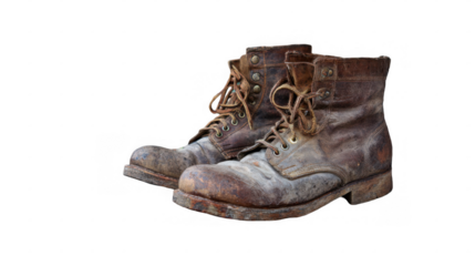 Worn leather work boots showing signs of heavy use isolated on a transparent background, ideal for concepts related to manual labor, workwear, or vintage and retro aesthetics