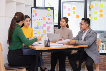 Group of business people working together with dashboard analysis and data management in conference room, Corporate business and dashboard to presentation concept.