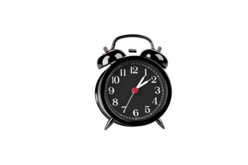 A classic black alarm clock, isolated on a transparent background, shows the time. background removed