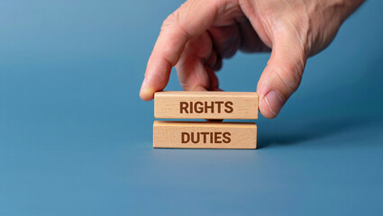 Balancing rights and duties wooden blocks concept image
