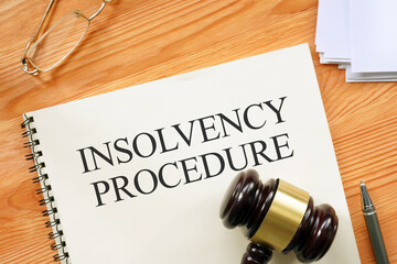Bankruptcy and Insolvency procedure is shown as business and legal concept