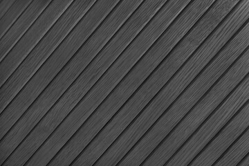Wooden diagonal plank, bamboo surface texture, board wall background. Painted wooden panels black color, wallpaper, backdrop, design element.