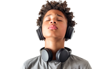 Portrait of a teenage mixed-ethnicity boy with headphones around his neck reacting to a funny message, isolated against on PNG transparent and white background. Ideal for social media, tech ads, youth