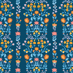 Seamless vector pattern with bright abstract flowers in folk art style on a deep blue background. Perfect for fabric, wallpaper, wrapping paper, and vibrant boho or ethnic-inspired designs.