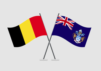 Belgium and Tristan da Cunha vector flags on soft gray with realistic wave