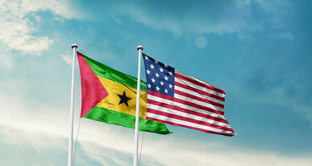 Sao Tome and Principe and America friendship flags are waving in the sky.Two country flag for agreement or deal. Sao Tome and Principe USA national flag for commitment.