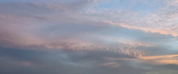 Fototapeta premium Beautiful pastel cloudy sunset .Gentle Sky Background at Sunset time, natural colors. 