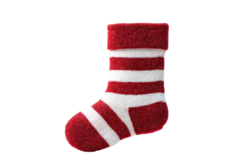 Red and white striped christmas sock isolated on black background, cut out