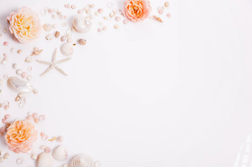 Summer beach flat lay with seashells, starfish, coral roses, soft shadows, white background, copy space, romantic vacation postcard, ocean themed decor, natural coastal style, minimal composition