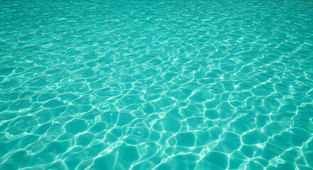 Obraz premium Crystal Clear Turquoise Water Surface Texture Background Ideal for Summer Vacation Designs Websites and More