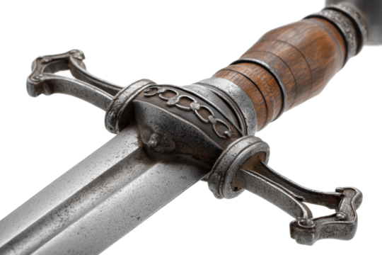 Close-up of medieval sword with detailed handle and crossguard on black background, cut out