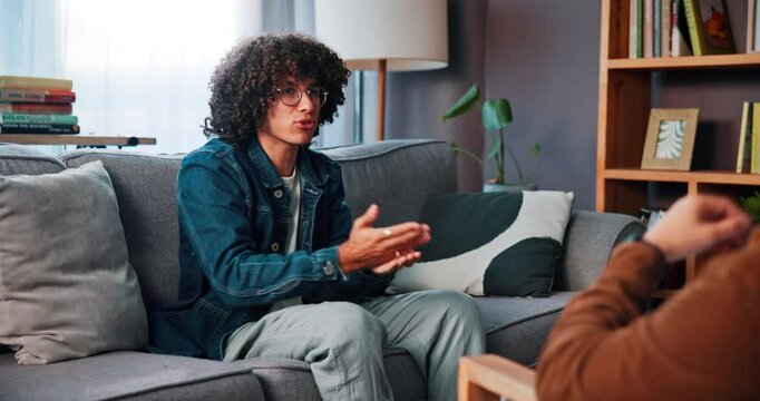 Counseling, talking and student on sofa with therapist for help, support and advice for college stress. Mental health, therapy and guidance counsellor with man for exam anxiety, burnout and failure