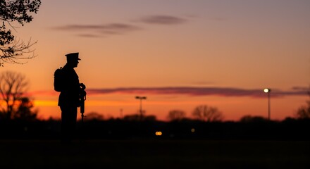 Silhouette of a Soldier Standing at Sunset A Tribute to Military Service and Sacrifice