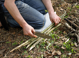 Preparation of twigs for the fire.