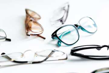 Stylish eyeglasses with lenses on white. Eye care and protection concept