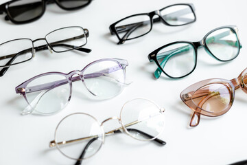 Set with different eyeglasses with lenses isolated on white