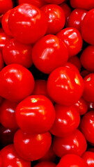 a background of fresh ripe red tomatoes 
