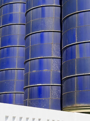 Blue Industrial Silos Close-up