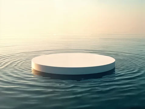Elegant Round Podium Hovering Over Water with Concentric Waves