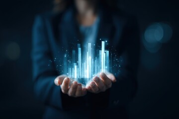 Woman holding digital graph in hands symbolizing growth and data analysis in dark blue tones