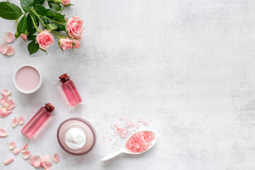 Beauty routine concept - skin care cosmetic with roses essential oil