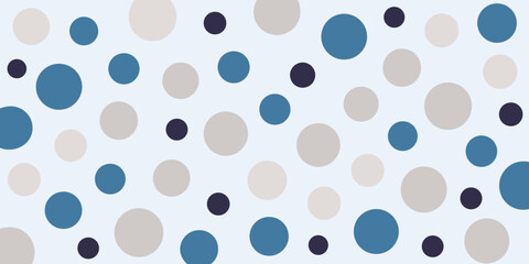 A playful pattern of varying-sized circles in shades of blue, gray, and dark purple against a light blue background.