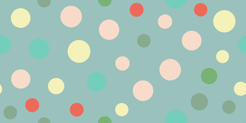 A teal background dotted with various-sized pastel circles in soft pink, mint green, yellow, and coral.