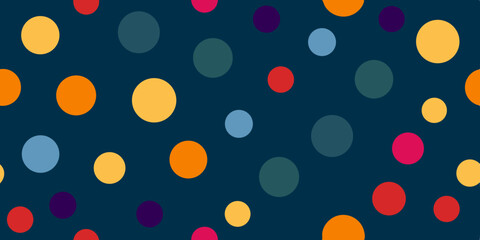 A textured background featuring a variety of colorful dots in shades of orange, blue, pink, and purple on a dark blue canvas.