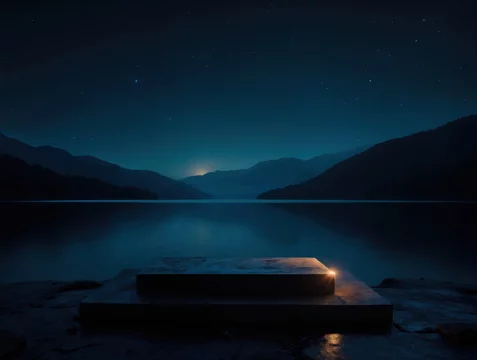 Matte Black Podium by Tranquil Lake with Starlight Reflections