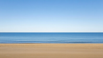 Fototapeta premium A serene blue ocean surface bordered by a brown sandy beach, with minimal details symbolizing harmony between sky and land. 