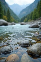 Close-up of riverbed stones under crystal clear mountain stream with natural light reflections and flowing water texture in a peaceful outdoor environment

