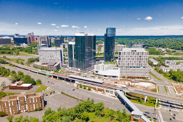 Aerial view of the city's architecture, Tysons Corner, skyscrapers and metro station.