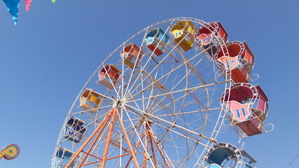 ferris wheel on a blue sky
