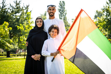 cinematic image of a family from the emirates spending time at the park